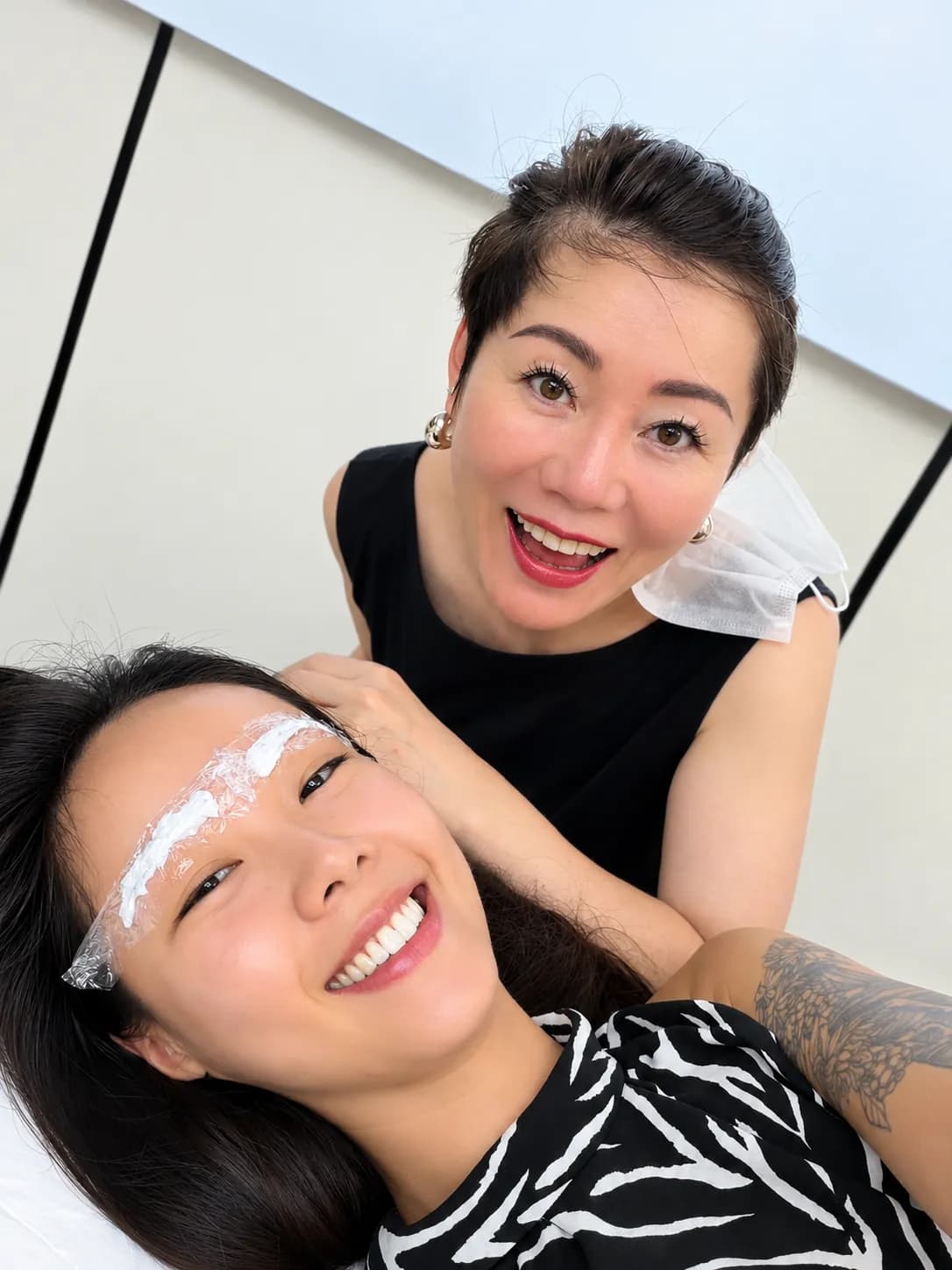 Lina Liu with a happy brow client