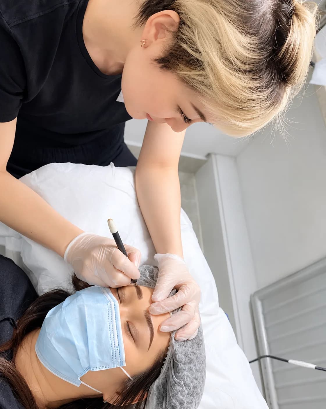 Lina doing Microblading