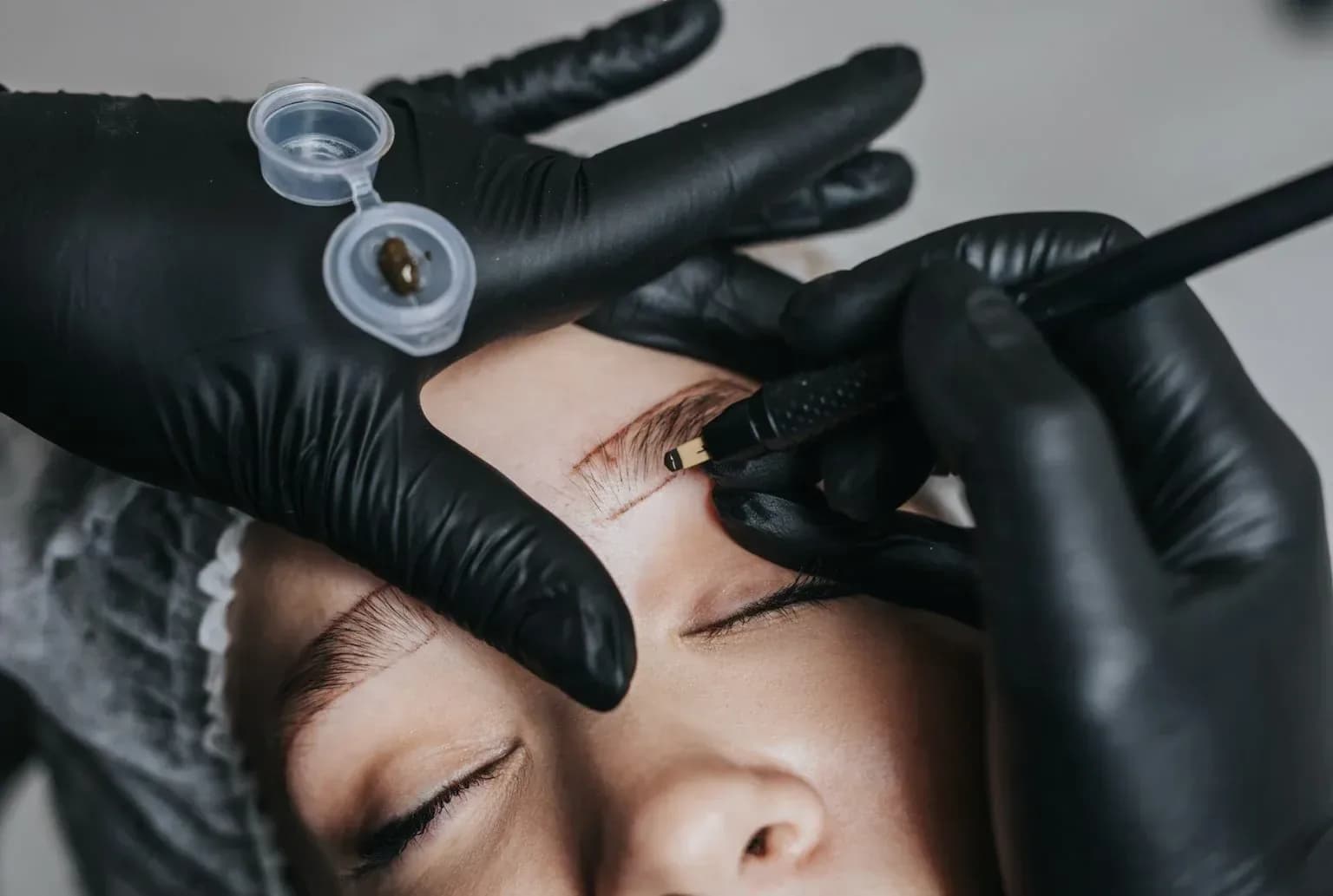 Close-up detail of precision Permanent Makeup brow work at Lina Liu Studio